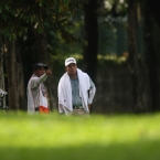 quiban with caddie poited his direction